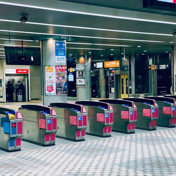 IC card turnstiles in Japanese train station that say IC
