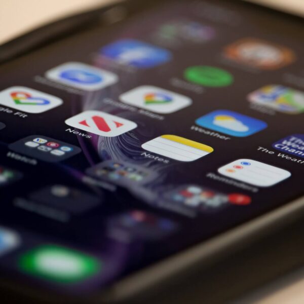 iphone displaying several app icons on the screen