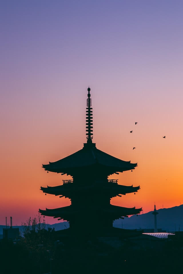 Silhouette of a tall pagoda in Kyoto
